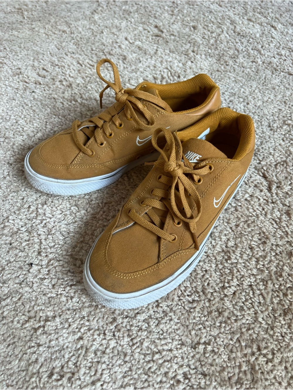 Nike Low-Top Sneakers in Mustard/Gold with White Swoosh